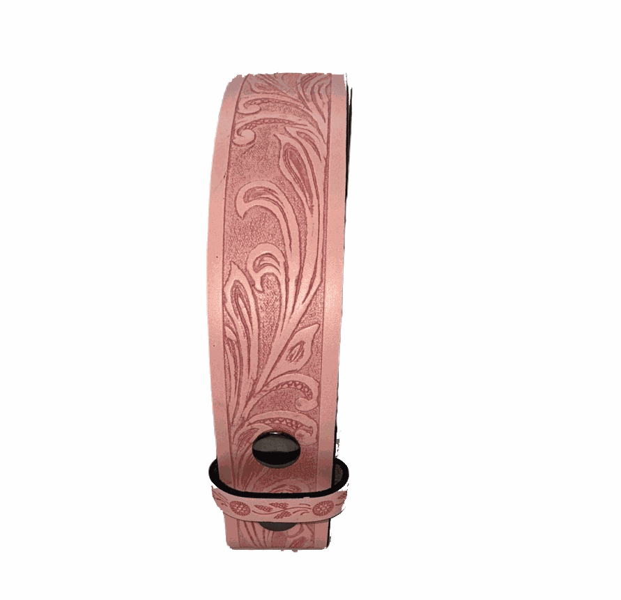 Pink faux leather tooled western belt with floral design.