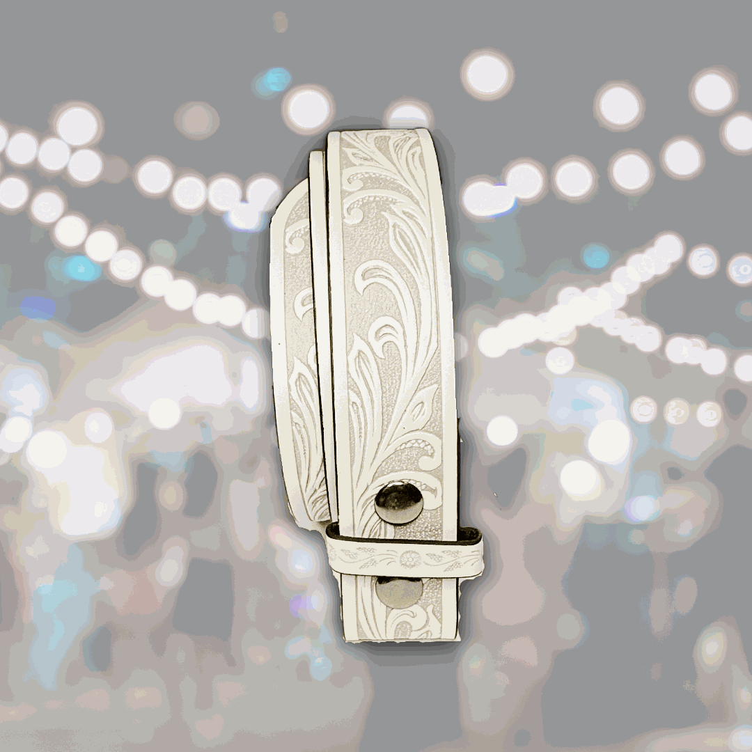Light blue faux leather belt strap with floral western design and snap closures for interchangeable buckles