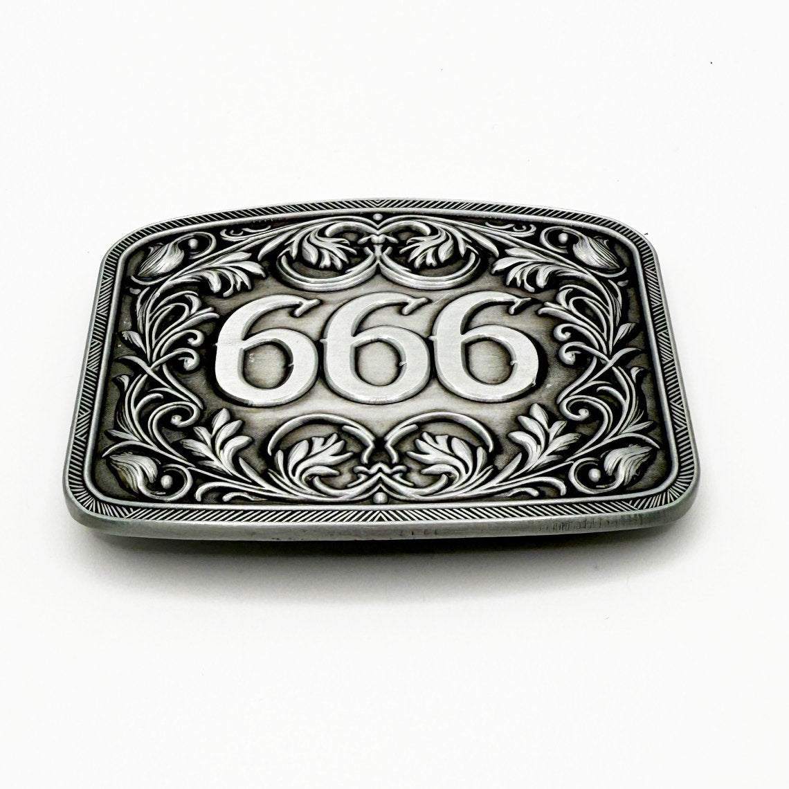 666 Buckle with engraved floral scrollwork.