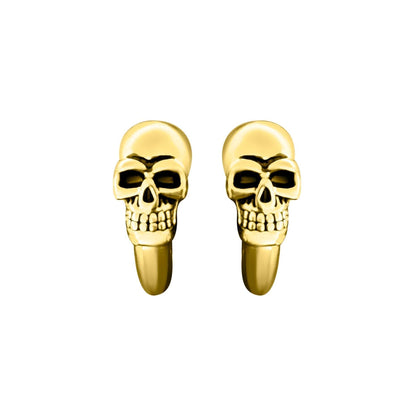 Gold skull earrings straight on view.