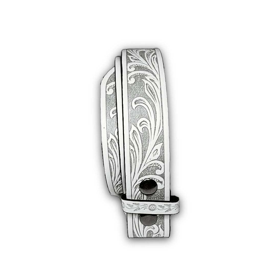 White faux leather belt strap with tooled floral design and snap-on buckle for interchangeable styling