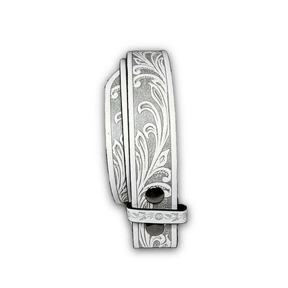White faux leather belt strap with tooled floral design and snap-on buckle for interchangeable styling