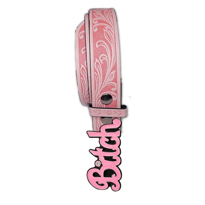 Pink belt with decorative patterns and a bold pink "Bitch" buckle.