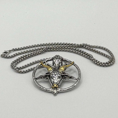 TornSlayer Goat Head Pentagram Necklace with silver and gold pendant on 22" chain.