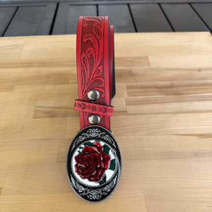 Red rose flower belt with decorative buckle on white background
